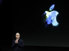 Apple CEO Tim Cook speaks during an announcement of new products in Cupertino, Calif.
