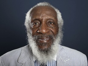 FILE - In this July 21, 2012 file photo, comedian and activist Dick Gregory poses for a portrait during the PBS TCA Press Tour in Beverly Hills, Calif. Gregory, the comedian and activist and who broke racial barriers in the 1960s and used his humor to spread messages of social justice and nutritional health, has died. He was 84. Gregory died late Saturday, Aug. 19, 2017, in Washington, D.C. after being hospitalized for about a week, his son Christian Gregory told The Associated Press. He had suffered a severe bacterial infection. (Photo by Matt Sayles/Invision/AP, File)