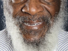 Comedian and activist Dick Gregory poses for a portrait during the PBS TCA Press Tour in Beverly Hills, Calif. Gregory, the comedian and activist and who broke racial barriers in the 1960s and used his humor to spread messages of social justice and nutritional health, has died. He was 84. Gregory died late Saturday, Aug. 19, 2017, in Washington, D.C. after being hospitalized for about a week, his son Christian Gregory told The Associated Press. He had suffered a severe bacterial infection.