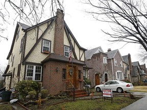 FILE - This  Jan. 17, 2017 file photo shows the boyhood home of President Donald Trump  in New York.    The 1940 Tudor-style house in Queens is on Airbnb and is being offered for $725 a night.  (AP Photo/Kathy Willens)