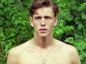 This image released by Neon shows Harris Dickinson in a scene from "Beach Rats." (Neon via AP)