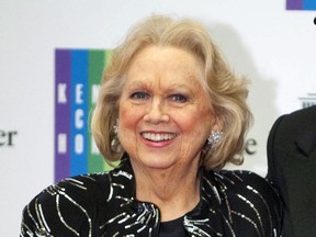 FILE - In this Dec. 7, 2013 file photo, Barbara Cook arrives at the State Department for the Kennedy Center Honors gala dinner in Washington. Cook, whose shimmering soprano made her one of Broadway's leading ingenues and later a major cabaret and concert interpreter of popular American song, has died. She was 89. (AP Photo/Kevin Wolf, File)