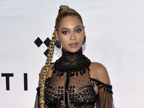 FILE - In this Oct. 15, 2016 file photo, singer Beyonce Knowles attends the Tidal X: 1015 benefit concert in New York. Beyonce says she's working with her charity to assist those in her hometown affected by Tropical Storm Harvey. The singer said she is working closely with her organization BeyGOOD and her pastor to find ways to help those affected. (Photo by Evan Agostini/Invision/AP, File)