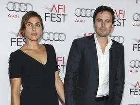 FILE - In this Nov. 9, 2013 file photo, actor Casey Affleck and his wife Summer Phoenix appear at the 2013 AFI Fest premiere of "Out of the Furnace" in Los Angeles. Court records in Los Angeles show that Summer Phoenix filed for divorce on Monday, July 31, 2017, citing irreconcilable differences as the reason for the end of their more than 10 year marriage. (Photo by Paul A. Hebert/Invision/AP, File)