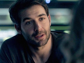 This image from video released by CBS shows James Wolk in a scene from, "Zoo," a series about wild animals attacking humans  (CBS via AP)