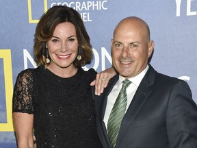 FILE - In this Sept. 21, 2016 file photo, LuAnn de Lesseps and her then fiance Thomas D'Agostino attend the premiere of National Geographic Channel's, "Years of Living Dangerously" in New York. The "Real Housewives of New York" cast member and her husband, D'Agostino, have decided to call it quits after seven months of marriage. The reality TV star tweeted the announcement on Thursday. It was confirmed by her publicist. (Photo by Evan Agostini/Invision/AP, File)