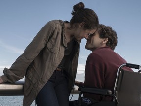 This image released by Roadside Attractions shows Tatiana Maslany, left, and Jake Gyllenhaal in a scene from "Stronger."  The film, which chronicles the story of Boston Marathon bombing survivor Jeff Bauman, will screen at the Spaulding Rehabilitation Hospital in Charlestown on Sept. 12, where Bauman and others who were injured in the 2013 deadly attack were treated. (Scott Garfield/Lionsgate and Roadside Attractions via AP)