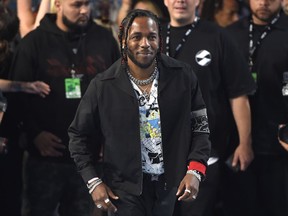 Kendrick Lamar arrives at the MTV Video Music Awards at The Forum on Sunday, Aug. 27, 2017, in Inglewood, Calif. (Photo by Chris Pizzello/Invision/AP)
