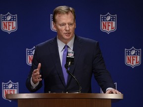 FILE - In this May 23, 2017, file photo, NFL commissioner Roger Goodell speaks to the media after an NFL owners meeting in Chicago. A year after the NFL launched the "Play Smart. Play Safe" initiative, pledging $100 million in support of independent medical research and engineering advancements, a huge chunk of that soon will be awarded to such research, primarily dedicated to neuroscience. (AP Photo/Paul Beaty, File)