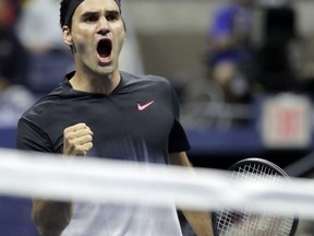 Roger Federer, of Switzerland, reacts after winning a game against Frances Tiafoe, of the United States, during the U.S. Open tennis tournament, Tuesday, Aug. 29, 2017, in New York. (AP Photo/Julio Cortez)