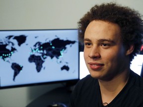 FILE - This Monday, May 15, 2017, file photo shows British IT expert Marcus Hutchins, branded a hero for slowing down the WannaCry global cyberattack, during an interview in Ilfracombe, England. Prosecutors have charged Hutchins and an unnamed co-defendant with conspiring to commit computer fraud in the state and elsewhere. Hutchins could enter a plea during a hearing Monday, Aug. 14, in Wisconsin federal court. (AP Photo/Frank Augstein, File)