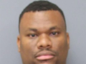 This undated photo provided by the Charles County Sheriff's Department shows Carlos Deangelo Bell. A teachers' aide and track coach described as a "predator" by a county prosecutor now faces more than 100 felony counts of child sex abuse and other offenses. Local media reported on Monday, July 31, 2017, that the counts against Bell include infecting or trying to infect three schoolboys with HIV, filming them in sex acts, giving them marijuana and other crimes from May 2015 to June 2017. (Charles County Sheriff's Department via AP)
