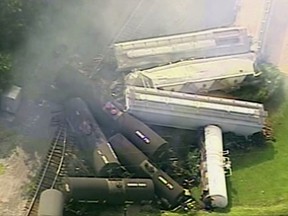 In this aerial image made from a video provided by WPXI, smoke rises in the air after dozens of cars of a freight train carrying hazardous materials derailed in Hyndman, Pa., Wednesday, Aug. 2, 2017. County officials ordered all residents of the small Pennsylvania town to evacuate after the derailment. (WPXI via AP)