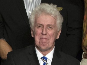 FILE - In this Dec. 15, 2016, photo, CNN commentator Jeffrey Lord, appears at a rally for President-elect Donald Trump in Hershey, Pa. CNN cut ties Thursday, Aug. 10, 2017, with Lord, a conservative commentator, after he tweeted a Nazi salute at a critic. (AP Photo/Matt Rourke, File)