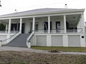 FILE - This May 21, 2008, file photo, shows the exterior of Beauvoir, the retirement estate of Confederate President Jefferson Davis in Biloxi, Miss. Beauvoir, a beachside estate on the Mississippi Gulf Coast, was Jefferson Davis' retirement home. Now it's a privately run museum. Its director issued a statement Thursday, Aug. 17, 2017, offering to take monuments that "any city or jurisdiction has decided to take down." The offer follows violence at a white nationalist rally held in Charlottesville, Va., amid plans there to remove a statue of Gen. Robert E. Lee. (AP Photo/Bill Haber, File)