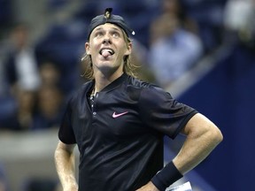 Denis Shapovalov, of Canada, awaits the result of a challenge in the third-set tiebreak during a match against Jo-Wilfried Tsonga, of France, at the U.S. Open tennis tournament in New York, Wednesday, Aug. 30, 2017. Shapovalov won the challenge and the match on that point, 6-4, 6-4, 7-6 (3). (AP Photo/Kathy Willens)