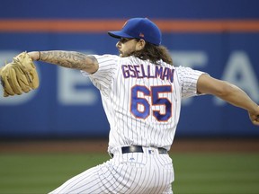 New York Mets' Robert Gsellman (65) delivers a pitch during the first inning of a baseball game against the New York Yankees Wednesday, Aug. 16, 2017, in New York. (AP Photo/Frank Franklin II)