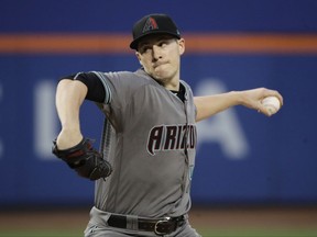 Arizona Diamondbacks' Patrick Corbin delivers a pitch during the first inning of a baseball game against the New York Mets Tuesday, Aug. 22, 2017, in New York. (AP Photo/Frank Franklin II)