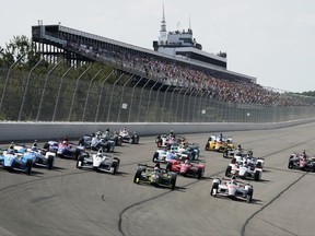 Drivers race after taking the green flag to start the IndyCar auto race at Pocono Raceway, Sunday, Aug. 20, 2017, in Long Pond, Pa. (AP Photo/Matt Slocum)