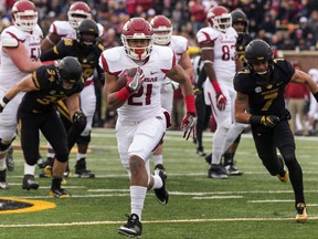 FILE - This Nov. 25, 2016 file photo shows Arkansas running back Devwah Whaley scoring on a 30-yard run during the first quarter of an NCAA college football game against Missouri in Columbia, Mo. Whaley was expected to once again serve in a backup role this season, a year after rushing for 602 yards as a freshman. However, with the career of Rawleigh Williams coming to an end after a second neck injury during the spring, the Razorbacks have turned to Whaley as their lead back entering the season. (AP Photo/L.G. Patterson, file)