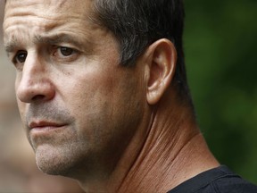 This July 28, 2017 photo shows Baltimore Ravens head coach John Harbaugh speaking at a news conference following an NFL football training camp practice in Owings Mills, Md. The Ravens have given Harbaugh a contract extension, even though the team has missed the playoffs in three of the last four years. (AP Photo/Patrick Semansky)