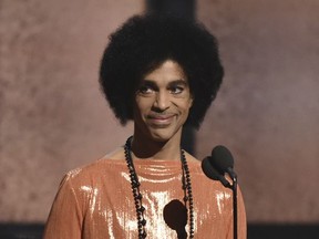 Sharon Nelson says in a statement Thursday, Aug. 31, 2017, to The Associated Press that "contrary to what has been said, purple was and is Prince's color." Tyka Nelson, Prince's only full sibling, told the London Evening Standard in a story published Aug. 21 that though people associate purple with the singer, his favorite color was orange. (Photo by John Shearer/Invision/AP, File)