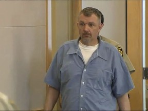 Anthony Lord, 37, of Crystal, Maine, is seen entering the courtroom before he was sentenced to life in prison on Monday, Aug. 7, 2017, in Bangor, Maine. Lord pleaded guilty last month to killing two people and wounding three others in a rampage in July 2015. (Mark Rediker/WABI-TV via AP)