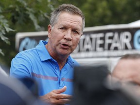 FILE - In a July 27, 2017 file photo, Ohio Gov. John Kasich speaks at a news conference at the Ohio State Fair, in Columbus, Ohio.  Kasich says Sunday, Aug. 20, 2017, that President Donald Trump needs to stop the staff chaos at the White House and "settle it down." Kasich is among those who fear the staff churn is hampering Trump's ability to notch a major legislative victory. (AP Photo/Jay LaPrete, File)