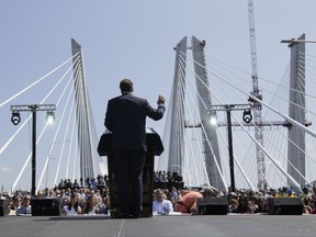 New York Governor Andrew Cuomo speaks during a ribbon cutting ceremony for the Tappan Zee Bridge replacement, called the The Gov. Mario M. Cuomo Bridge, near Tarrytown, N.Y., Thursday, Aug. 24, 2017. The event was held a day before vehicles start rolling across the massive new Hudson River span. Cuomo and a host of other dignitaries attended Thursday's ceremony for the 3-mile long bridge, which is being named after Cuomo's late father. (AP Photo/Seth Wenig)
