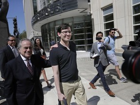 Martin Shkreli, center, leaves federal court in New York, Friday, Aug. 4, 2017. The former pharmaceutical CEO has been convicted on federal charges he deceived investors in a pair of failed hedge funds. A Brooklyn jury deliberated five days before finding Shkreli guilty on Friday on three of eight counts. (AP Photo/Seth Wenig)