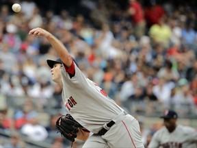 Boston Red Sox's Drew Pomeranz delivers a pitch during the first inning of a baseball game against the New York Yankees, Saturday, Aug. 12, 2017, in New York. (AP Photo/Frank Franklin II)