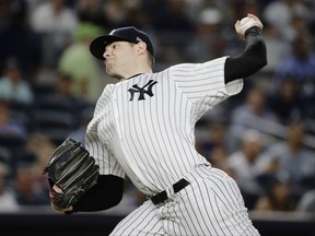 New York Yankees' Jordan Montgomery delivers a pitch during the first inning of a baseball game against the Boston Red Sox, Sunday, Aug. 13, 2017, in New York. (AP Photo/Frank Franklin II)