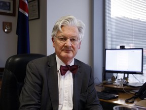New Zealand lawmaker Peter Dunne sits in his office in Wellington, New Zealand Monday, Aug, 21, 2017. The United Future party leader resigned Monday, the third party leader to quit during August ahead of what is shaping up to be a close general election in September. (AP photo/Nick Perry)