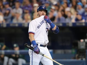 Toronto Blue Jays 3B Josh Donaldson walks back to the dugout after striking out against the Oakland A's on July 25.
