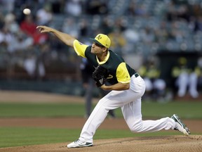Oakland Athletics pitcher Kendall Graveman works against the Texas Ranger during the first inning of a baseball game Friday, Aug. 25, 2017, in Oakland, Calif. (AP Photo/Ben Margot)