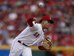 Cincinnati Reds starting pitcher Luis Castillo (58) throws against the St. Louis Cardinals during the first inning of a baseball game, Saturday, Aug. 5, 2017, in Cincinnati. (AP Photo/Gary Landers)