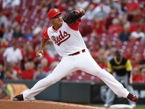 Cincinnati Reds starting pitcher Robert Stephenson throws during the first inning of a baseball game against the Pittsburgh Pirates, Friday, Aug. 25, 2017, in Cincinnati. The Reds won 4-2. (AP Photo/John Minchillo)