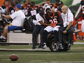 Cincinnati Bengals strong safety Shawn Williams (36) is carted off the field during the first half of an NFL preseason football game against the Kansas City Chiefs, Saturday, Aug. 19, 2017, in Cincinnati. (AP Photo/Gary Landers)