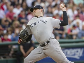 New York Yankees starting pitcher Jordan Montgomery delivers to Cleveland Indians' Brandon Guyer during the first inning of a baseball game in Cleveland, Saturday, Aug. 5, 2017. (AP Photo/Phil Long)