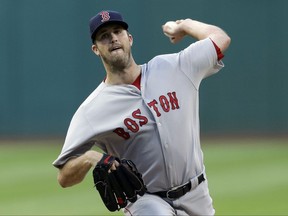 Boston Red Sox starting pitcher Drew Pomeranz delivers in the first inning of a baseball game against the Cleveland Indians, Wednesday, Aug. 23, 2017, in Cleveland. (AP Photo/Tony Dejak)