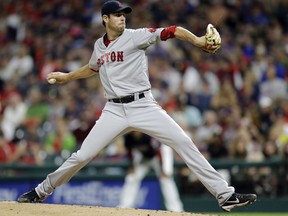 Boston Red Sox starting pitcher Doug Fister delivers in the first inning of a baseball game against the Cleveland Indians, Tuesday, Aug. 22, 2017, in Cleveland. (AP Photo/Tony Dejak)