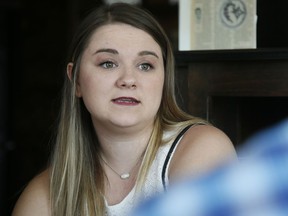 In this Wednesday, Aug. 9, 2017 photo, Danyelle Dyer talks during an interview in Edmond, Okla. Dyer had to obtain a court order after the man who molested her when she was 7 years old moved in next door. (AP Photo/Sue Ogrocki)