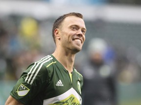 FILE - In this Oct. 16, 2016, file photo, Portland's Jack Jewsbury reacts after Portland's 1-0 win against the Colorado Rapids in a Major League Soccer match at Providence Park in Portland, Ore. After retiring last season, three players stayed with the Portland Timbers in another capacity. Former captain Jack Jewsbury is now Portland's director of business development, while fellow midfielder Ned Grabavoy was named director of scouting and recruitment. Defender Nat Borchers _ who spent most of his career in Salt Lake _ joined the Timbers' broadcast team. (Billy Gates/The Oregonian via AP, File)