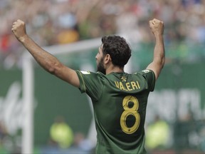 Portland Timbers' Diego Valeri (8) celebrates after scoring a goal during an MLS soccer game against the Los Angeles Galaxy in Portland, Ore., Sunday, Aug. 6, 2017. (Sean Meagher/The Oregonian via AP)