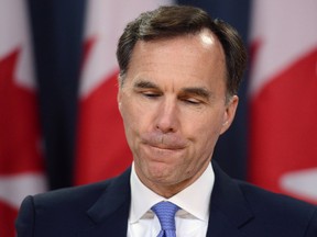 Minister of Finance Bill Morneau holds a press conference at the National Press Theatre in Ottawa on Tuesday, July 18, 2017.