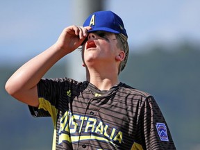 Australia pitcher Tom Stancic collects himself on the mound after allowing a run to score on a wild pitch in second inning of an International pool play baseball game against Japan at the Little League World Series tournament in South Williamsport, Pa., Friday, Aug. 18, 2017. (AP Photo/Gene J. Puskar)