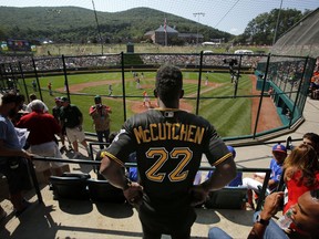 Pittsburgh Pirates' Andrew McCutchen (22) watches from the stands behind home plate at Lamade Field during a baseball game between Fairfield, Conn., and Lufkin, Texas in United States pool play at the Little League World Series tournament in South Williamsport, Pa., Sunday, Aug. 20, 2017. The Pirates will be playing the St. Louis Cardinals in Bowman Stadium in Williamsport, Pa., on Sunday Night Baseball. (AP Photo/Gene J. Puskar)