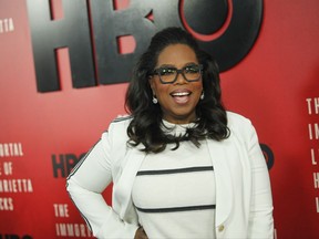 FILE - In this April 18, 2017, file photo, Oprah Winfrey attends the premiere of HBO Films' "The Immortal Life of Henrietta Lacks" at the SVA Theatre in New York. Winfrey told Vogue magazine for an article published online Aug. 14, 2017, that hat the high-profile fluctuations in her weight over the years were "a physical, spiritual, emotional burden" burden for her, but at 63, she says there are no more apologies.  (Photo by Andy Kropa/Invision/AP, File)