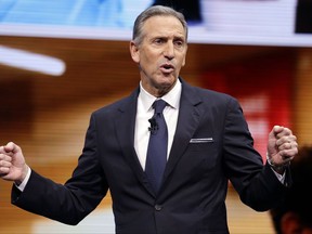FILE - In this March 22, 2017, file photo, Starbucks CEO Howard Schultz speaks at the Starbucks annual shareholders meeting in Seattle. Schultz has told employees at an employee following the violence at the Aug. 12, 2017, white nationalist rally in Charlottesville, Virginia, that bigotry, hatred and senseless acts of violence against "people who are not white" cannot stand. (AP Photo/Elaine Thompson, File)