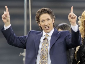 This April 24, 2010 file photo shows Lakewood Church pastor Joel Osteen at Dodger Stadium during his "A Night of Hope" in Los Angeles. Osteen said in a statement to ABC News on Aug. 28, 2017, that his Lakewood Church would open as a shelter for Hurricane Harvey victims if needed.
